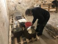 The Cunaide Stone after being moved inside the Heritage Centre. Sue is seen here applying paper pulp to absorb the moisture. The Cunaide Stone after being moved inside the Heritage Centre. Sue is seen here applying paper pulp to absorb the moisture.